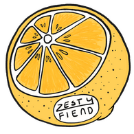 Zestyfiend logo, ripe lemon half with the name "Zestyfiend" as a fruit sticker at the bottom of the lemon